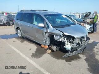 2011 Toyota Sienna XLE AAS with VIN 5TDYK3DC8BS156127, listed as a IAAI auction lot 42103980 with 129,851 mi miles. Bid and sale history available at carsss.com. Image 1.