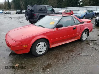 1986 Toyota MR2 z VIN JT2AW15C3G0056187, wystawiony jako Copart lot #45431545 z przebiegiem 128 456 mil mil oraz Tytuł czysty. Historia ofert i sprzedaży dostępna na DreamBid. Obrazek 1.