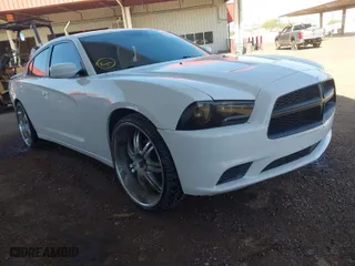 2012 Dodge Charger SE with VIN 2C3CDXBG1CH258360, listed as a IAAI auction lot 41937619 with 127,167 mi miles. Bid and sale history available at carsss.com. Image 1.