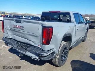 2025 GMC Sierra 1500 AT4 with VIN 3GTUUEELXSG138620, listed as a IAAI auction lot 41805574 with 13,056 mi miles. Bid and sale history available at carsss.com. Image 4.