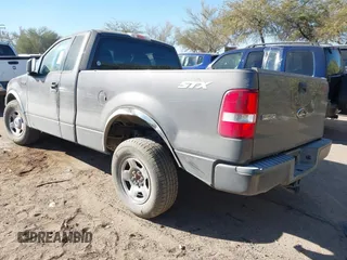 2005 Ford F-150 XL with VIN 1FTRF12275KC36456, listed as a IAAI auction lot 41341871 with 174,498 mi miles. Bid and sale history available at carsss.com. Image 3.