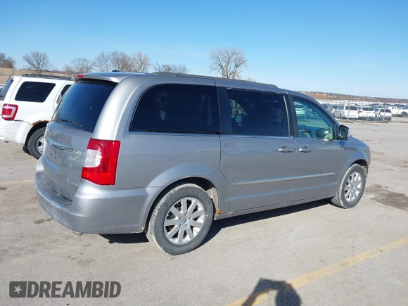 2013 Chrysler Town & Country Touring-L with VIN 2C4RC1CG6DR650928, listed as a IAAI auction lot 41740639 with 198,678 mi miles. Bid and sale history available at carsss.com. Image 13.
