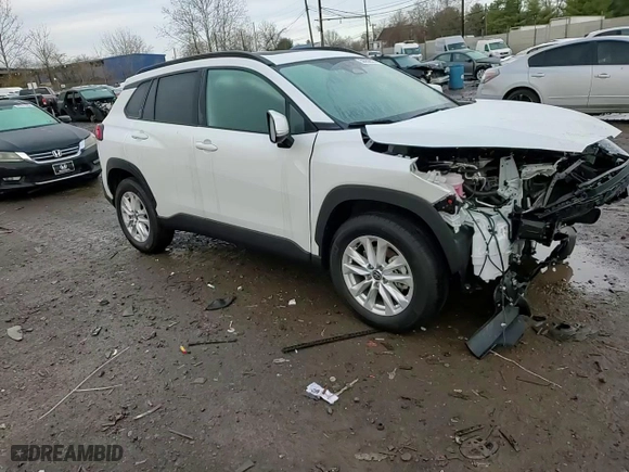 2024 Toyota Corolla Cross LE with VIN 7MUBAABG6RV101517, listed as a Copart auction lot 50352515 with 10,035 mi miles and Salvage Title. Bid and sale history available at carsss.com. Image 12.