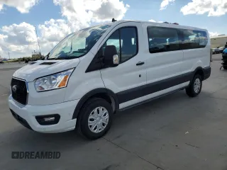 2022 Ford Transit Passenger XL with VIN 1FBAX2Y84NKA83986, listed as a Copart auction lot 77745014 with Not Provided miles and Salvage Title. Bid and sale history available at carsss.com. Image 1.