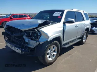 2015 Toyota 4Runner Limited with VIN JTEBU5JR0F5216462, listed as a IAAI auction lot 41665409 with 100,447 mi miles and . Bid and sale history available at carsss.com. Image 2.
