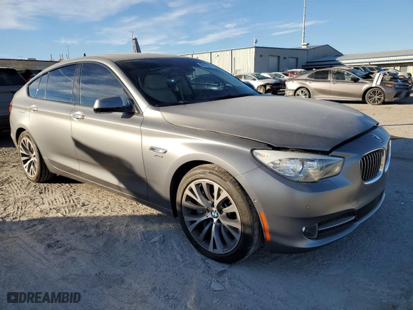 2012 BMW 5 Series Gran Turismo 550i xDrive with VIN WBASP4C5XCC341957, listed as a Copart auction lot 88172615 with 106,342 mi miles and Salvage Title. Bid and sale history available at carsss.com. Image 4.