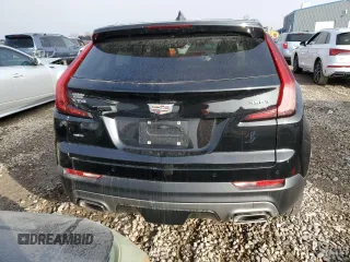 2021 Cadillac XT4 AWD Premium Luxury with VIN 1GYFZDR40MF080166, listed as a Copart auction lot 82883764 with 27,793 mi miles and Salvage Title. Bid and sale history available at carsss.com. Image 6.