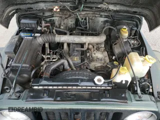 1997 Jeep Wrangler Sahara with VIN 1J4FY49SXVP453369, listed as a Copart auction lot 72826744 with 145,852 mi miles and Salvage Title. Bid and sale history available at carsss.com. Image 12.