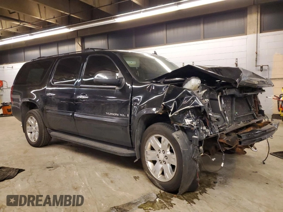 2007 GMC Yukon XL SLT z VIN 1GKFK16377J349144, wystawiony jako Copart lot #84300374 z przebiegiem Nie podano mil oraz Szkoda całkowita • Salvage title. Historia ofert i sprzedaży dostępna na DreamBid. Obrazek 4.