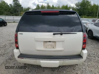 2011 GMC Yukon Denali with VIN 1GKS1EEFXBR313625, listed as a Copart auction lot 72634294 with 129,834 mi miles and Salvage Title. Bid and sale history available at carsss.com. Image 6.