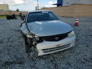 2000 Toyota Solara SE with VIN 2T1CG22P0YC277702, listed as a Copart auction lot 47311565 with 371,789 mi miles and Salvage Title. Bid and sale history available at carsss.com. Image 10.