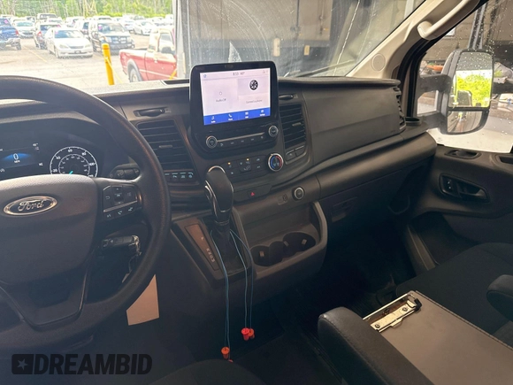 2020 Ford Transit Cargo z VIN 1FTBR2YG5LKA32432, wystawiony jako IAAI lot #42493895 z przebiegiem 134 672 mil mil oraz . Historia ofert i sprzedaży dostępna na DreamBid. Obrazek 6.