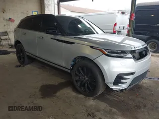 2019 Land Rover Range Rover Velar R-Dynamic SE z VIN SALYL2EX7KA787059, wystawiony jako IAAI lot #41960205 z przebiegiem 80 612 mil mil oraz . Historia ofert i sprzedaży dostępna na DreamBid. Obrazek 1.