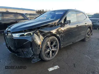 2025 BMW iX xDrive50 with VIN WB523CF0XSCT63136, listed as a Copart auction lot 44538265 with 230 mi miles and Salvage Title. Bid and sale history available at carsss.com. Image 1.