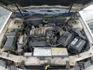 1994 Ford Taurus GL z VIN 1FALP52U5RA152732, wystawiony jako Copart lot #70472324 z przebiegiem 52 781 mil mil oraz Szkoda całkowita • Salvage title. Historia ofert i sprzedaży dostępna na DreamBid. Obrazek 12.