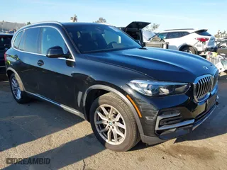 2023 BMW X5 sDrive40i with VIN 5UXCR4C01P9R58557, listed as a IAAI auction lot 41826741 with 10,142 mi miles. Bid and sale history available at carsss.com. Image 1.