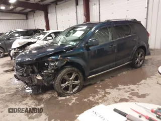 2014 Dodge Journey Crossroad with VIN 3C4PDDGG4ET302527, listed as a IAAI auction lot 41351441 with 137,260 mi miles and . Bid and sale history available at DreamBid. Image 2.