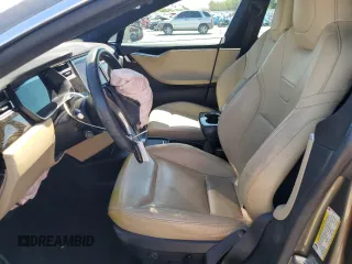 2016 Tesla Model S 70 with VIN 5YJSA1E1XGF147239, listed as a Copart auction lot 56529075 with 82,562 mi miles and Salvage title. Bid and sale history available at DreamBid. Image 7.