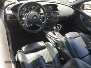 2009 BMW 6 Series 650i z VIN WBAEA535X9CV92734, wystawiony jako Copart lot #52678395 z przebiegiem 237 588 mil mil oraz Czysty tytuł • Clean title. Historia ofert i sprzedaży dostępna na DreamBid. Obrazek 8.