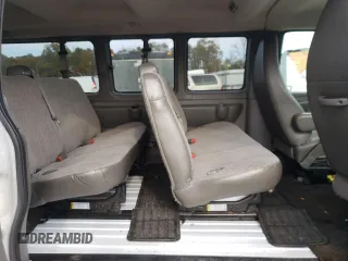 2014 Chevrolet Express Passenger LT with VIN 1GAZG1FG2E1202457, listed as a Copart auction lot 82704884 with 142,982 mi miles and Salvage title. Bid and sale history available at DreamBid. Image 11.