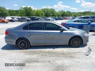 2014 Volkswagen Jetta S z VIN 3VW2K7AJ6EM253571, wystawiony jako IAAI lot #42186222 z przebiegiem 171 518 mil mil oraz . Historia ofert i sprzedaży dostępna na DreamBid. Obrazek 13.