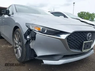 2020 Mazda 3 Select with VIN 3MZBPACL0LM131878, listed as a IAAI auction lot 42274393 with 105,656 mi miles and . Bid and sale history available at DreamBid. Image 17.