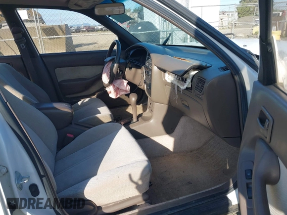1995 Toyota Camry LE z VIN JT2SK12E5S0332027, wystawiony jako IAAI lot #42078977 z przebiegiem 128 929 mil mil oraz . Historia ofert i sprzedaży dostępna na DreamBid. Obrazek 5.