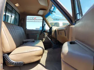 1988 Ford F-150 с VIN 1FTEF14Y1JPA75504, выставлен на аукционе IAAI как лот 42473753 с пробегом 12 730 миль миль и . История ставок и продаж доступна на DreamBid. Изображение 5.