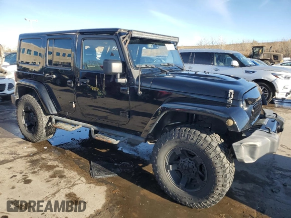 2016 Jeep Wrangler Unlimited 75th Anniversary with VIN 1C4BJWEG7GL113824, listed as a Copart auction lot 81372864 with 98,497 mi miles and Salvage title. Bid and sale history available at DreamBid. Image 4.