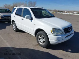 2000 Mercedes-Benz M-Class with VIN 4JGAB54E9YA165824, listed as a IAAI auction lot 41587899 with 49,893 mi miles. Bid and sale history available at carsss.com. Image 1.