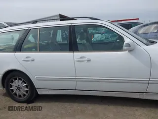 2001 Mercedes-Benz E-Class with VIN WDBJH65J31B364290, listed as a IAAI auction lot 41545677 with 162,040 mi miles. Bid and sale history available at carsss.com. Image 14.