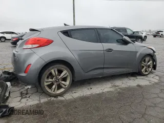 2015 Hyundai Veloster z VIN KMHTC6AD4FU241307, wystawiony jako Copart lot #53704525 z przebiegiem Nie podano mil oraz Szkoda całkowita • Salvage title. Historia ofert i sprzedaży dostępna na DreamBid. Obrazek 3.