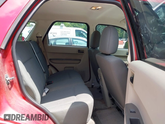 2009 Ford Escape XLS z VIN 1FMCU02799KA20370, wystawiony jako IAAI lot #42811109 z przebiegiem 195 451 mil mil oraz . Historia ofert i sprzedaży dostępna na DreamBid. Obrazek 8.