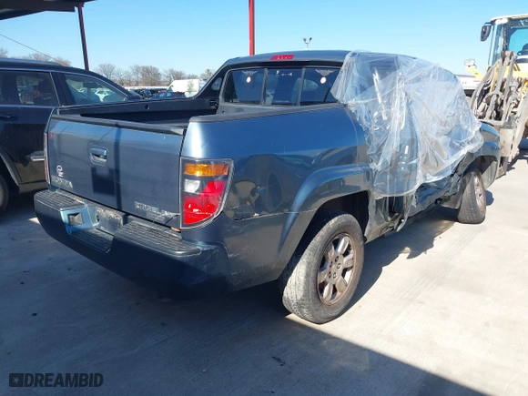 2006 Honda Ridgeline RTL with VIN 2HJYK16566H571367, listed as a IAAI auction lot 41342775 with 250,432 mi miles. Bid and sale history available at carsss.com. Image 4.