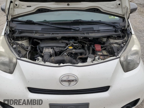 2012 Scion iQ z VIN JTNJJXB07CJ013314, wystawiony jako Copart lot #60961445 z przebiegiem 172 480 mil mil oraz Szkoda całkowita • Salvage title. Historia ofert i sprzedaży dostępna na DreamBid. Obrazek 11.