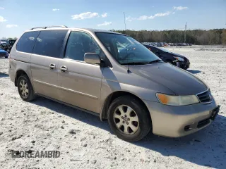 2004 Honda Odyssey EX-L with VIN 5FNRL18974B085790, listed as a Copart auction lot 49159665 with 179,207 mi miles and Salvage Title. Bid and sale history available at DreamBid. Image 4.