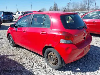 2010 Toyota Yaris with VIN JTDKT4K36A5295530, listed as a IAAI auction lot 41896456 with 337,570 mi miles. Bid and sale history available at carsss.com. Image 3.