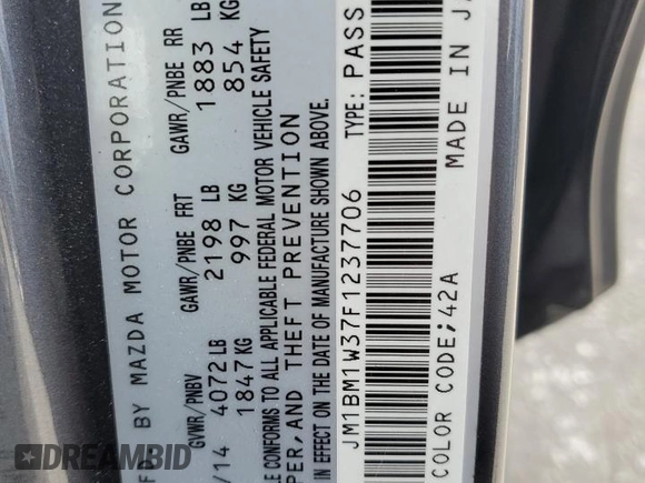 2015 Mazda 3 S Grand Touring with VIN JM1BM1W37F1237706, listed as a Copart auction lot 52785545 with 112,657 mi miles and Salvage Title. Bid and sale history available at DreamBid. Image 12.