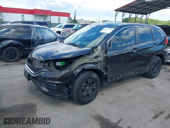 2015 Honda CR-V LX with VIN 2HKRM4H38FH601802, listed as a IAAI auction lot 42177101 with 71,775 mi miles and . Bid and sale history available at DreamBid. Image 6.