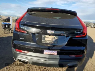 2020 Cadillac XT4 AWD Premium Luxury with VIN 1GYFZDR49LF032597, listed as a Copart auction lot 88595595 with 82,324 mi miles and Salvage title. Bid and sale history available at DreamBid. Image 6.