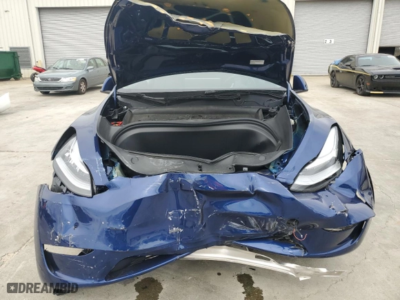 2023 Tesla Model Y Long Range with VIN 7SAYGDEE2PA096705, listed as a Copart auction lot 47790545 with 9,195 mi miles and Salvage Title. Bid and sale history available at carsss.com. Image 5.