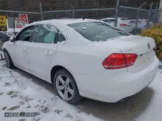 2012 Volkswagen Passat SE with VIN 1VWBP7A35CC052679, listed as a IAAI auction lot 41268199 with 125,691 mi miles. Bid and sale history available at carsss.com. Image 3.