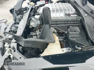 2021 Dodge Charger SRT Hellcat Redeye Widebody with VIN 2C3CDXL95MH660822, listed as a IAAI auction lot 42892087 with 53,461 mi miles and . Bid and sale history available at DreamBid. Image 20.