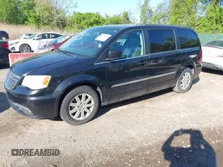 2013 Chrysler Town & Country Touring with VIN 2C4RC1BG3DR759137, listed as a IAAI auction lot 42138138 with 196,397 mi miles. Bid and sale history available at carsss.com. Image 2.