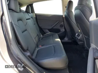 2024 Tesla Model Y Long Range с VIN 7SAYGDEE8RF184146, выставлен на аукционе Copart как лот 61194535 с пробегом 8 225 миль миль и Списание • Salvage title. История ставок и продаж доступна на DreamBid. Изображение 10.