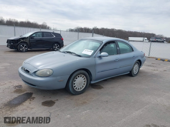 1997 Mercury Sable GS with VIN 1MELM50U5VA652727, listed as a IAAI auction lot 41701998 with 213,563 mi miles and . Bid and sale history available at DreamBid. Image 2.