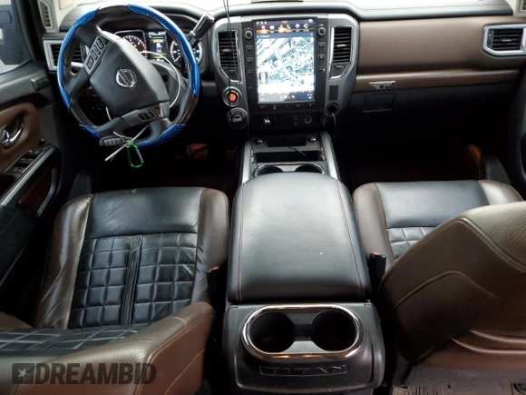 2016 Nissan Titan Platinum Reserve with VIN 1N6BA1F4XGN515605, listed as a Copart auction lot 65182285 with 62,139 mi miles and Clean title. Bid and sale history available at DreamBid. Image 8.