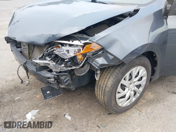 2018 Toyota Corolla L with VIN 2T1BURHE1JC007046, listed as a IAAI auction lot 42417100 with 69,845 mi miles and . Bid and sale history available at DreamBid. Image 6.