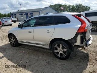 2014 Volvo XC60 R-Design Premier Plus with VIN YV4902DZ5E2516262, listed as a Copart auction lot 57967335 with 123,313 mi miles and Salvage title. Bid and sale history available at DreamBid. Image 2.