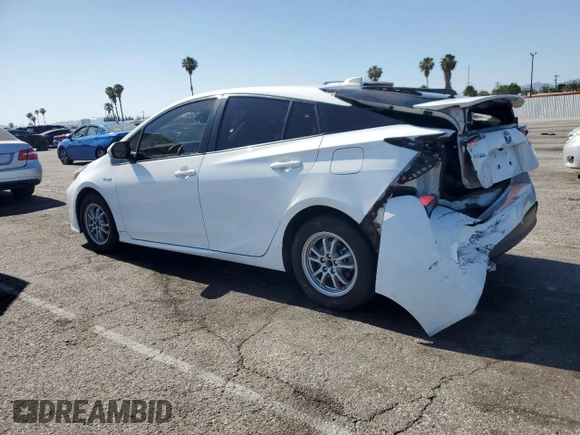 2021 Toyota Prius L Eco z VIN JTDKAMFU4M3145800, wystawiony jako Copart lot #59180285 z przebiegiem 33 991 mil mil oraz Czysty tytuł • Clean title. Historia ofert i sprzedaży dostępna na DreamBid. Obrazek 2.